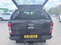 USED 2018 18 FORD RANGER Black 3.2 TDCi Wildtrak pickup, 98,000 miles, Automatic 4WD, 18in Alloys, Sat nav, Rear camera, Touchscreen, A/C. Plus VAT @ 20%! This 2018 Ford Ranger TDCi Wildtrak is ready for its next adventure, benefiting from a 12 month MOT provided on purchase and a 3 month warranty for your peace of mind. and a very goood service History @ 1K, 23K, 34K, 46K, 58K, 73K, and 95K  Under the bonnet, you'll find a robust 3.2L diesel engine paired with a capable four wheel drive system, making it well suited for a variety of tasks and terrains.  Inside, the Wildtrak trim offers comfort and convenience with Dual Zone Electronic Automatic T