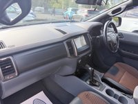 USED 2018 18 FORD RANGER Black 3.2 TDCi Wildtrak pickup, 98,000 miles, Automatic 4WD, 18in Alloys, Sat nav, Rear camera, Touchscreen, A/C. Plus VAT @ 20%! This 2018 Ford Ranger TDCi Wildtrak is ready for its next adventure, benefiting from a 12 month MOT provided on purchase and a 3 month warranty for your peace of mind. and a very goood service History @ 1K, 23K, 34K, 46K, 58K, 73K, and 95K  Under the bonnet, you'll find a robust 3.2L diesel engine paired with a capable four wheel drive system, making it well suited for a variety of tasks and terrains.  Inside, the Wildtrak trim offers comfort and convenience with Dual Zone Electronic Automatic T
