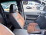 USED 2018 18 FORD RANGER Black 3.2 TDCi Wildtrak pickup, 98,000 miles, Automatic 4WD, 18in Alloys, Sat nav, Rear camera, Touchscreen, A/C. Plus VAT @ 20%! This 2018 Ford Ranger TDCi Wildtrak is ready for its next adventure, benefiting from a 12 month MOT provided on purchase and a 3 month warranty for your peace of mind. and a very goood service History @ 1K, 23K, 34K, 46K, 58K, 73K, and 95K  Under the bonnet, you'll find a robust 3.2L diesel engine paired with a capable four wheel drive system, making it well suited for a variety of tasks and terrains.  Inside, the Wildtrak trim offers comfort and convenience with Dual Zone Electronic Automatic T