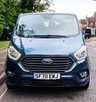 USED 2020 70 FORD TOURNEO CUSTOM 2.0 320 EcoBlue Titanium Minibus 5dr Diesel Auto L1 Euro 6 (s/s) (130 ps).*SIX SEATS+RAMP*AUTO*FORD HISTORY*OVER 70 MINIBUSES IN STOCK* This 2020 Ford Tourneo Custom 2.0 320 EcoBlue Titanium Auto L1 Euro 6 (s/s) 5dr presents a superb ownership proposition, having been meticulously maintained by its single owner and boasting a low mileage of just 49,000 miles for its age.  This 320 Titanium derivative, powered by an efficient 2.0L Euro 6 diesel engine, offers a refined driving experience.  It comes equipped with practical features such as door mirrors with blind spot eliminator and integrated side indicators, including BLIS blind