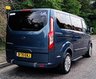 USED 2020 70 FORD TOURNEO CUSTOM 2.0 320 EcoBlue Titanium Minibus 5dr Diesel Auto L1 Euro 6 (s/s) (130 ps).*SIX SEATS+RAMP*AUTO*FORD HISTORY*OVER 70 MINIBUSES IN STOCK* This 2020 Ford Tourneo Custom 2.0 320 EcoBlue Titanium Auto L1 Euro 6 (s/s) 5dr presents a superb ownership proposition, having been meticulously maintained by its single owner and boasting a low mileage of just 49,000 miles for its age.  This 320 Titanium derivative, powered by an efficient 2.0L Euro 6 diesel engine, offers a refined driving experience.  It comes equipped with practical features such as door mirrors with blind spot eliminator and integrated side indicators, including BLIS blind