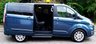 USED 2020 70 FORD TOURNEO CUSTOM 2.0 320 EcoBlue Titanium Minibus 5dr Diesel Auto L1 Euro 6 (s/s) (130 ps).*SIX SEATS+RAMP*AUTO*FORD HISTORY*OVER 70 MINIBUSES IN STOCK* This 2020 Ford Tourneo Custom 2.0 320 EcoBlue Titanium Auto L1 Euro 6 (s/s) 5dr presents a superb ownership proposition, having been meticulously maintained by its single owner and boasting a low mileage of just 49,000 miles for its age.  This 320 Titanium derivative, powered by an efficient 2.0L Euro 6 diesel engine, offers a refined driving experience.  It comes equipped with practical features such as door mirrors with blind spot eliminator and integrated side indicators, including BLIS blind