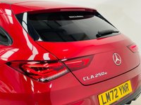 USED 2022 72 MERCEDES-BENZ CLA 1.3 CLA250e 15.6kWh AMG Line (Premium) Shooting Brake 5dr Petrol Plug-in Hybrid 8G-DCT Euro 6 (s/s) (218 ps) Patagonia Red | Black Leather Interior | Night Pack | Ambient Lighting | Privacy Glass | Widescreen Media | Heated Seats