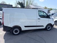 USED 2018 68 FORD TRANSIT CUSTOM White 2.0 300 EcoBlue panel van, 94,000 miles, Euro 6, ULEZ compliant, 6-speed manual, Aftermarket Touchscreen, Reverse Camera, Bluetooth. No VAT! This 2018 Ford Transit Custom offers excellent peace of mind with its MOT valid until December 2026. This 2.0 300 EcoBlue L1 H1 Euro 6 5dr model is equipped with a reliable 2.0L Diesel Engine and meets Euro 6 emissions standards. For your entertainment and connectivity needs, it features an AM-FM Radio with USB and Bluetooth, along with an Emergency Assistance function. The ICE Pack 12 provides a single DIN sized audio unit, also including Bluetooth functionality and a aftermarket touchscreen di