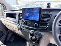 USED 2018 68 FORD TRANSIT CUSTOM White 2.0 300 EcoBlue panel van, 94,000 miles, Euro 6, ULEZ compliant, 6-speed manual, Aftermarket Touchscreen, Reverse Camera, Bluetooth. No VAT! This 2018 Ford Transit Custom offers excellent peace of mind with its MOT valid until December 2026. This 2.0 300 EcoBlue L1 H1 Euro 6 5dr model is equipped with a reliable 2.0L Diesel Engine and meets Euro 6 emissions standards. For your entertainment and connectivity needs, it features an AM-FM Radio with USB and Bluetooth, along with an Emergency Assistance function. The ICE Pack 12 provides a single DIN sized audio unit, also including Bluetooth functionality and a aftermarket touchscreen di