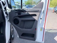 USED 2018 68 FORD TRANSIT CUSTOM White 2.0 300 EcoBlue panel van, 94,000 miles, Euro 6, ULEZ compliant, 6-speed manual, Aftermarket Touchscreen, Reverse Camera, Bluetooth. No VAT! This 2018 Ford Transit Custom offers excellent peace of mind with its MOT valid until December 2026. This 2.0 300 EcoBlue L1 H1 Euro 6 5dr model is equipped with a reliable 2.0L Diesel Engine and meets Euro 6 emissions standards. For your entertainment and connectivity needs, it features an AM-FM Radio with USB and Bluetooth, along with an Emergency Assistance function. The ICE Pack 12 provides a single DIN sized audio unit, also including Bluetooth functionality and a aftermarket touchscreen di