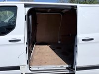 USED 2018 68 FORD TRANSIT CUSTOM White 2.0 300 EcoBlue panel van, 94,000 miles, Euro 6, ULEZ compliant, 6-speed manual, Aftermarket Touchscreen, Reverse Camera, Bluetooth. No VAT! This 2018 Ford Transit Custom offers excellent peace of mind with its MOT valid until December 2026. This 2.0 300 EcoBlue L1 H1 Euro 6 5dr model is equipped with a reliable 2.0L Diesel Engine and meets Euro 6 emissions standards. For your entertainment and connectivity needs, it features an AM-FM Radio with USB and Bluetooth, along with an Emergency Assistance function. The ICE Pack 12 provides a single DIN sized audio unit, also including Bluetooth functionality and a aftermarket touchscreen di