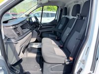 USED 2018 68 FORD TRANSIT CUSTOM White 2.0 300 EcoBlue panel van, 94,000 miles, Euro 6, ULEZ compliant, 6-speed manual, Aftermarket Touchscreen, Reverse Camera, Bluetooth. No VAT! This 2018 Ford Transit Custom offers excellent peace of mind with its MOT valid until December 2026. This 2.0 300 EcoBlue L1 H1 Euro 6 5dr model is equipped with a reliable 2.0L Diesel Engine and meets Euro 6 emissions standards. For your entertainment and connectivity needs, it features an AM-FM Radio with USB and Bluetooth, along with an Emergency Assistance function. The ICE Pack 12 provides a single DIN sized audio unit, also including Bluetooth functionality and a aftermarket touchscreen di