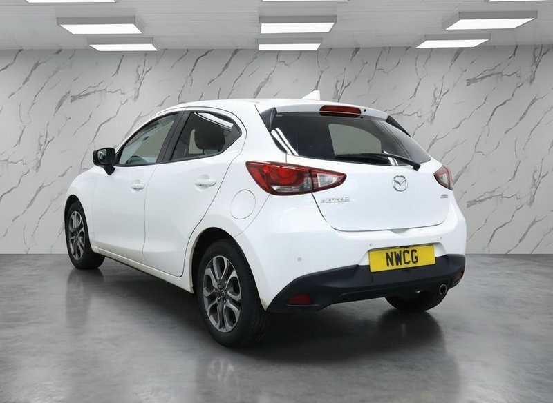 2019 Mazda Mazda2 in white — photo 3 of 11