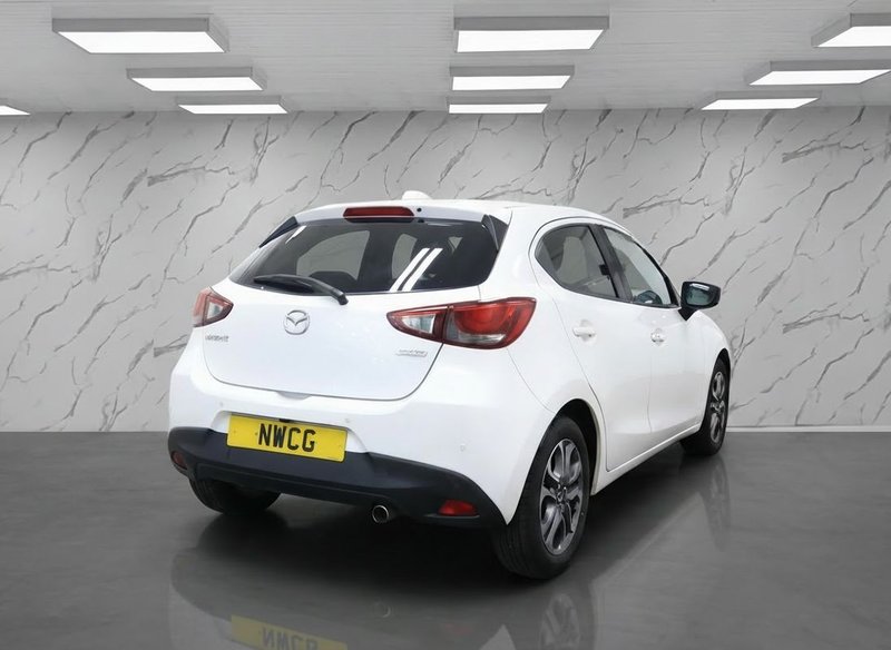 2019 Mazda Mazda2 in white — photo 4 of 11