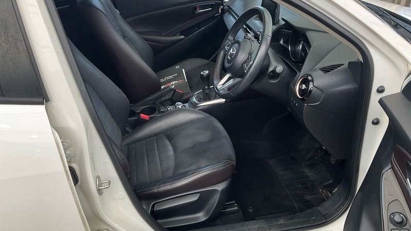 2019 Mazda Mazda2 in white — photo 10 of 11