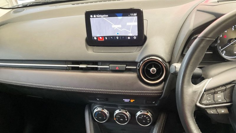 2019 Mazda Mazda2 in white — photo 7 of 11