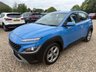 USED 2021 21 HYUNDAI KONA 1.0 T-GDi MHEV SE Connect SUV 5dr Petrol Hybrid Manual Euro 6 (s/s) (120 ps) 48,701 MILES+THIS VEHICLE WILL COME WITH A NEW 12 MONTH MOT+8 INCH TOUCHSCREEN DISPLAY WITH AUDIO AND SMART DEVICE+BLUETOOTH CONNECTIVITY+AIR-CONDITIONING+AUTOMATIC HEADLIGHTS WITH DUSK SENSOR+PARKING ASSISTANCE WITH PARKING CAMERA+'SURFY BLUE' PAINT+17 INCH ALLOY WHEEL