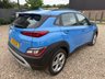 USED 2021 21 HYUNDAI KONA 1.0 T-GDi MHEV SE Connect SUV 5dr Petrol Hybrid Manual Euro 6 (s/s) (120 ps) 48,701 MILES+THIS VEHICLE WILL COME WITH A NEW 12 MONTH MOT+8 INCH TOUCHSCREEN DISPLAY WITH AUDIO AND SMART DEVICE+BLUETOOTH CONNECTIVITY+AIR-CONDITIONING+AUTOMATIC HEADLIGHTS WITH DUSK SENSOR+PARKING ASSISTANCE WITH PARKING CAMERA+'SURFY BLUE' PAINT+17 INCH ALLOY WHEEL