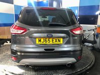 USED 2015 65 FORD KUGA 1.5T EcoBoost Titanium SUV 5dr Petrol Manual 2WD Euro 6 (s/s) (150 ps) A truly stunning example of this Ulez compliant very low mileage Suv fin ished in Magnetic Grey complimented with 18" alloys .This car comes with full dealer service history and comes equipped with front and rear parking sensors with self park facility ,full electric tailgate with release , Dab cd radio with usb inputs ,Bluetooth connectivity ,rapid clear front screen ,dual zone digital climate control ,Ford Sync voice control system ,cruise control and speed limiter ,auto lights and wipers ,pow