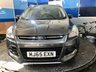 USED 2015 65 FORD KUGA 1.5T EcoBoost Titanium SUV 5dr Petrol Manual 2WD Euro 6 (s/s) (150 ps) A truly stunning example of this Ulez compliant very low mileage Suv fin ished in Magnetic Grey complimented with 18" alloys .This car comes with full dealer service history and comes equipped with front and rear parking sensors with self park facility ,full electric tailgate with release , Dab cd radio with usb inputs ,Bluetooth connectivity ,rapid clear front screen ,dual zone digital climate control ,Ford Sync voice control system ,cruise control and speed limiter ,auto lights and wipers ,pow