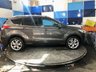 USED 2015 65 FORD KUGA 1.5T EcoBoost Titanium SUV 5dr Petrol Manual 2WD Euro 6 (s/s) (150 ps) A truly stunning example of this Ulez compliant very low mileage Suv fin ished in Magnetic Grey complimented with 18" alloys .This car comes with full dealer service history and comes equipped with front and rear parking sensors with self park facility ,full electric tailgate with release , Dab cd radio with usb inputs ,Bluetooth connectivity ,rapid clear front screen ,dual zone digital climate control ,Ford Sync voice control system ,cruise control and speed limiter ,auto lights and wipers ,pow