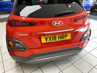 USED 2018 18 HYUNDAI KONA 1.6 T-GDI 176PS 4WD PREMIUM GT DC AUTOMATIC 5DR HATCHBACK TANGERINE COMET PEARL / DARK KNIGHT ROOF / BLACK LEATHER TRIM / CLIMATE CONTROL / HEATED FRONT SEATS / ELECTRIC FRONT SEATS / ELECTRIC WINDOWS / POWERFOLD MIRRORS / AUTO LIGHT & WIPERS / LANE ASSIST / FM AM TUNER / BLUETOOTH / APPLE CARPLAY / ANDROID AUTO / REAR PARKING CAMERA AND SENSORS / PRIVACY GLASS / 18" ALLOY WHEELS / SERVICE HISTORY