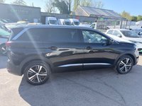 USED 2019 19 PEUGEOT 5008 Black 1.2 PureTech Allure SUV, 45,700 miles, Euro 6, Automatic, 7 Seats, Sat nav, Reverse camera, Cruise, DAB, 18in Alloys, Mirrorscreen. This 2019 Peugeot 5008 Allure is a remarkably low mileage example for its age, having covered just 45,700 miles. This seven seat SUV is powered by an efficient 1.2 litre petrol engine and meets Euro 6 emissions standards. It comes equipped with the Safety Plus Pack, featuring Blind Spot Assistance, along with front and rear parking sensors and parking assistance. Stay connected and entertained with the Bluetooth telephone facility and Mirror Screen, which supports both Android Auto and Apple Car