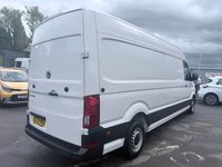 USED 2022 72 VOLKSWAGEN CRAFTER White 2.0 TDI CR35 Trendline van, 78,400 miles, Euro 6, ULEZ compliant, 6-Speed manual, A/C, Bluetooth, Cruise, DAB, F&R sensors. Plus VAT @ 20%! This 2022 Volkswagen Crafter presents an exceptional ownership proposition, having been meticulously maintained by a single owner with a service history at 20k, 53k, 72k, 78k, most recently serviced on 19th February 2026 at 78,191 miles. This 2.0 TDI CR35 Trendline FWD LWB High Roof model, registered in 2022, is powered by an efficient 2.0 litre Euro 6 diesel engine and boasts a substantial 3000 kg towing weight. For your peace of mind, it will be supplied with a 12 month MOT upon purchase, ensu