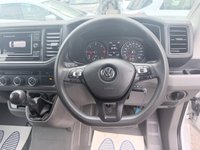 USED 2022 72 VOLKSWAGEN CRAFTER White 2.0 TDI CR35 Trendline van, 78,400 miles, Euro 6, ULEZ compliant, 6-Speed manual, A/C, Bluetooth, Cruise, DAB, F&R sensors. Plus VAT @ 20%! This 2022 Volkswagen Crafter presents an exceptional ownership proposition, having been meticulously maintained by a single owner with a service history at 20k, 53k, 72k, 78k, most recently serviced on 19th February 2026 at 78,191 miles. This 2.0 TDI CR35 Trendline FWD LWB High Roof model, registered in 2022, is powered by an efficient 2.0 litre Euro 6 diesel engine and boasts a substantial 3000 kg towing weight. For your peace of mind, it will be supplied with a 12 month MOT upon purchase, ensu