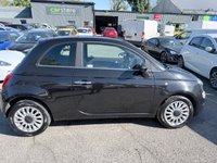 USED 2023 23 FIAT 500 Black 1.0 MHEV hatchback, 41,000 miles, Euro 6, ULEZ compliant, 6-Speed manual, 7in screen, CarPlay/Android Auto, Sunroof, A/C, DAB. This 2023 Fiat 500 is a superb example, having had only one owner from new. It is powered by an efficient 1.0 litre petrol engine, meeting Euro 6 emissions standards. Inside, you'll find a 7in HD touchscreen radio complete with Bluetooth, USB, and DAB functionality, seamlessly integrating with your smartphone via Apple CarPlay and Android Auto. Comfort is assured with air conditioning, while the fixed sunroof, which includes a panoramic option, adds to the airy feel. Practicality is enhanced by