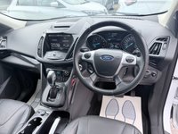USED 2015 65 FORD KUGA White 1.5T EcoBoost Titanium X SUV, 81,300 miles, Euro 6, ULEZ compliant, Automatic AWD, 8in screen, Sat nav, Panorama roof, 18in alloys, A/C This 2015 Ford Kuga T Titanium X boasts an MOT valid until January 2027, offering excellent peace of mind for the new owner.  This Four Wheel Drive model is powered by an efficient 1.5 litre petrol engine and meets Euro 6 emissions standards.  Inside, you'll find a wealth of features designed for comfort and convenience, including a striking Panorama Roof with a fixed panoramic sunroof, Dual Zone Electronic Automatic Temperature Control for personalised cabin comfort, and Bi-Xenon headlights for