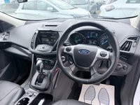 USED 2015 65 FORD KUGA White 1.5T EcoBoost Titanium X SUV, 81,300 miles, Euro 6, ULEZ compliant, Automatic AWD, 8in screen, Sat nav, Panorama roof, 18in alloys, A/C This 2015 Ford Kuga T Titanium X boasts an MOT valid until January 2027, offering excellent peace of mind for the new owner.  This Four Wheel Drive model is powered by an efficient 1.5 litre petrol engine and meets Euro 6 emissions standards.  Inside, you'll find a wealth of features designed for comfort and convenience, including a striking Panorama Roof with a fixed panoramic sunroof, Dual Zone Electronic Automatic Temperature Control for personalised cabin comfort, and Bi-Xenon headlights for