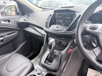 USED 2015 65 FORD KUGA White 1.5T EcoBoost Titanium X SUV, 81,300 miles, Euro 6, ULEZ compliant, Automatic AWD, 8in screen, Sat nav, Panorama roof, 18in alloys, A/C This 2015 Ford Kuga T Titanium X boasts an MOT valid until January 2027, offering excellent peace of mind for the new owner.  This Four Wheel Drive model is powered by an efficient 1.5 litre petrol engine and meets Euro 6 emissions standards.  Inside, you'll find a wealth of features designed for comfort and convenience, including a striking Panorama Roof with a fixed panoramic sunroof, Dual Zone Electronic Automatic Temperature Control for personalised cabin comfort, and Bi-Xenon headlights for