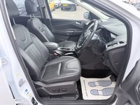 USED 2015 65 FORD KUGA White 1.5T EcoBoost Titanium X SUV, 81,300 miles, Euro 6, ULEZ compliant, Automatic AWD, 8in screen, Sat nav, Panorama roof, 18in alloys, A/C This 2015 Ford Kuga T Titanium X boasts an MOT valid until January 2027, offering excellent peace of mind for the new owner.  This Four Wheel Drive model is powered by an efficient 1.5 litre petrol engine and meets Euro 6 emissions standards.  Inside, you'll find a wealth of features designed for comfort and convenience, including a striking Panorama Roof with a fixed panoramic sunroof, Dual Zone Electronic Automatic Temperature Control for personalised cabin comfort, and Bi-Xenon headlights for