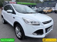 USED 2015 65 FORD KUGA White 1.5T EcoBoost Titanium X SUV, 81,300 miles, Euro 6, ULEZ compliant, Automatic AWD, 8in screen, Sat nav, Panorama roof, 18in alloys, A/C This 2015 Ford Kuga T Titanium X boasts an MOT valid until January 2027, offering excellent peace of mind for the new owner.  This Four Wheel Drive model is powered by an efficient 1.5 litre petrol engine and meets Euro 6 emissions standards.  Inside, you'll find a wealth of features designed for comfort and convenience, including a striking Panorama Roof with a fixed panoramic sunroof, Dual Zone Electronic Automatic Temperature Control for personalised cabin comfort, and Bi-Xenon headlights for