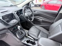 USED 2015 65 FORD KUGA White 1.5T EcoBoost Titanium X SUV, 81,300 miles, Euro 6, ULEZ compliant, Automatic AWD, 8in screen, Sat nav, Panorama roof, 18in alloys, A/C This 2015 Ford Kuga T Titanium X boasts an MOT valid until January 2027, offering excellent peace of mind for the new owner.  This Four Wheel Drive model is powered by an efficient 1.5 litre petrol engine and meets Euro 6 emissions standards.  Inside, you'll find a wealth of features designed for comfort and convenience, including a striking Panorama Roof with a fixed panoramic sunroof, Dual Zone Electronic Automatic Temperature Control for personalised cabin comfort, and Bi-Xenon headlights for