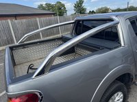 USED 2016 16 MITSUBISHI L200 2.5 DI-D Barbarian Pickup Double Cab 4dr Diesel Auto 4WD Euro 5 (LB) (175 ps) This 2016 Mitsubishi L200 Barbarian stands out with its exceptionally low mileage of just 55,020 miles for its age, a clear indicator of its careful use. This 2.5 DI-D Barbarian Auto 4WD Euro 5 4dr (LB) model is equipped with a robust 2.5 litre diesel engine and benefits from a Four Wheel Drive drivetrain, making it ready for a variety of tasks. Its vehicle history check is clear, offering peace of mind to potential buyers, and it falls into a low insurance group, which is a notable advantage.