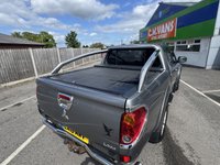 USED 2016 16 MITSUBISHI L200 2.5 DI-D Barbarian Pickup Double Cab 4dr Diesel Auto 4WD Euro 5 (LB) (175 ps) This 2016 Mitsubishi L200 Barbarian stands out with its exceptionally low mileage of just 55,020 miles for its age, a clear indicator of its careful use. This 2.5 DI-D Barbarian Auto 4WD Euro 5 4dr (LB) model is equipped with a robust 2.5 litre diesel engine and benefits from a Four Wheel Drive drivetrain, making it ready for a variety of tasks. Its vehicle history check is clear, offering peace of mind to potential buyers, and it falls into a low insurance group, which is a notable advantage.