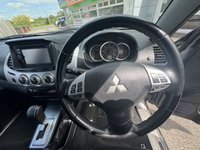 USED 2016 16 MITSUBISHI L200 2.5 DI-D Barbarian Pickup Double Cab 4dr Diesel Auto 4WD Euro 5 (LB) (175 ps) This 2016 Mitsubishi L200 Barbarian stands out with its exceptionally low mileage of just 55,020 miles for its age, a clear indicator of its careful use. This 2.5 DI-D Barbarian Auto 4WD Euro 5 4dr (LB) model is equipped with a robust 2.5 litre diesel engine and benefits from a Four Wheel Drive drivetrain, making it ready for a variety of tasks. Its vehicle history check is clear, offering peace of mind to potential buyers, and it falls into a low insurance group, which is a notable advantage.