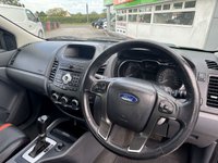 USED 2015 65 FORD RANGER 3.2 TDCi Wildtrak Pickup Double Cab 4dr Diesel Auto 4WD Euro 5 (200 ps) This 2015 Ford Ranger 3.2 TDCi Wildtrak Auto 4WD Euro 5 4dr boasts a clear vehicle history, offering peace of mind for its next owner. This robust four wheel drive pickup is powered by a capable 3.2 litre diesel engine and features the desirable Wildtrak trim, known for its distinctive styling and enhanced features. With a substantial towing weight of 3500 kg, this Ranger is ready for demanding tasks, whether for work or leisure. The Wildtrak variant stands out with its specific enhancements.