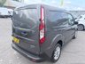 USED 2023 23 FORD TRANSIT CONNECT Grey 1.5 240 EcoBlue Limited panel van, 57,200 miles, ULEZ compliant, 6-speed manual, A/C, alloys, cruise, heated seat, rear sensors. Plus VAT @ 20%! This 2023 Ford Transit Connect, a 240 Limited derivative, boasts a single owner from new, offering excellent provenance. It features a 1.5 litre EcoBlue diesel engine, meeting Euro 6 emission standards, and comes with a 3 month warranty for your peace of mind. Inside, you'll find convenient power front windows with one touch up and down functionality, a header courtesy light with two map lights for improved visibility, and a single driver sunvisor complete with a mirror and ticket pocket. The ex