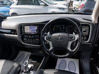 USED 2017 17 MITSUBISHI OUTLANDER Black 2.0h 12kWh 4h PHEV SUV, 46,500 miles, ULEZ compliant, Automatic, 4WD, Sunroof, Sat Nav, Leather, Heated seats, Climate control, 360 Camera This 2017 Mitsubishi Outlander 4h offers exceptionally low mileage for its age, having covered just 46,500 miles. This 2.0L Petrol Plug-in Hybrid is a Euro 6 compliant vehicle, benefiting from Four Wheel Drive for assured traction. It comes with a 3 month warranty and an MOT valid until December 2026, providing peace of mind. Notable features include Air Conditioning with Dual Climate Control, LED Headlights with Auto Levelling, and a 360 Degree Camera for effortless parking assistance.  Further