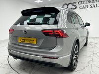 USED 2020 70 VOLKSWAGEN TIGUAN 1.5 TSI EVO R-Line Tech SUV 5dr Petrol DSG Euro 6 (s/s) (150 ps) Finished In Tungsten Silver, This Tiguan Comes With An Electric Panoramic Roof, R-Line Embossed Stitching, Electric Tailgate, Reverse Camera, Front And Rear Parking Sensors, Heated Seats, Service History, 20" Alloy Wheels, 12 Months MOT, 3 Months Warranty. Finance And Extended Warranty Available.