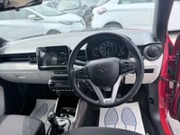 USED 2018 18 SUZUKI IGNIS Red 1.2 Dualjet MHEV SZ5 ALLGRIP, 33,038 miles, Euro 6, ULEZ compliant, Manual, 16in Alloys, Sat nav, Rear Camera, Bluetooth, Cruise, A/C. This 2018 Suzuki Ignis SZ5 boasts exceptionally low mileage for its age, having covered just 33,038 miles, and has been cared for by only two owners. This Euro 6 compliant, 1.2 litre petrol hybrid model features a capable four wheel drive system, making it a versatile choice. It comes with a 3 month warranty for your peace of mind and its MOT is valid until March 2027. Notable features include integrated Bluetooth for seamless phone connectivity, striking LED projector headlamps, and a rear park