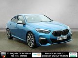 USED 2020 20 BMW 2 SERIES GRAN COUPE 2.0 M235i Saloon 4dr Petrol Auto xDrive Euro 6 (s/s) (306 ps) HIGH QUALITY BMW IN A HEAD TURNING COLOUR COMBINATION - COMES WITH A FULL SERVICE HISTORY + VIRTUAL COCKPIT DIGITAL DASH DISPLAY + HEAD UP DISPLAY + SATELLITE NAVIGATION + HARMAN KARDON SOUND SYSTEM + APPLE CARPLAY / ANDROID AUTO + ENHANCED BLUETOOTH PHONE PREPARATION WITH USB AUDI INTERFACE AND VOICE CONTROL + APPS CONTROL + DAB DIGITAL RADIO + CRUISE CONTROL + FRONT AND REAR PARKING ASSIST + DUAL ZONE CLIMATE CONTROL + AIR CONDITIONING + ADAPTIVE AUTOMATIC LED HEADLIGHTS WITH HIGH BEAM ASSIST