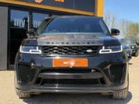 USED 2020 20 LAND ROVER RANGE ROVER SPORT 5.0 P575 V8 GPF SVR SUV 5dr Petrol Auto 4WD Euro 6 (s/s) (575 ps) Our stunning Range Rover Sport 5.0 V8 Supercharged SVR is the ultimate SUV combining performance and practicality like no other vehicle on the road - our Range Rover SVR is finished in breathtaking Santorini Black Metallic and sits on 22 Inch 5 Split Spoke Gloss Black Alloy Wheels and has the SVR-specific Exposed Carbon Fibre Bonnet, which really makes this SUV stand out and completes the Sporty appearance. The interior comes with the must-have Panoramic Sunroof, which shines a light on the Beau