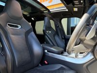 USED 2020 20 LAND ROVER RANGE ROVER SPORT 5.0 P575 V8 GPF SVR SUV 5dr Petrol Auto 4WD Euro 6 (s/s) (575 ps) Our stunning Range Rover Sport 5.0 V8 Supercharged SVR is the ultimate SUV combining performance and practicality like no other vehicle on the road - our Range Rover SVR is finished in breathtaking Santorini Black Metallic and sits on 22 Inch 5 Split Spoke Gloss Black Alloy Wheels and has the SVR-specific Exposed Carbon Fibre Bonnet, which really makes this SUV stand out and completes the Sporty appearance. The interior comes with the must-have Panoramic Sunroof, which shines a light on the Beau
