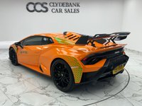 USED 2023 23 LAMBORGHINI HURACAN 5.2 V10 LP 640-2 STO Coupe 2dr Petrol LDF Euro 6 (s/s) (640 ps) Finished In Lamborghinis Luxurious Arancio Livrea Lucido, This Huracan Boasts Big Spec, Such As The Full Exterior Carbon Pack, Rear Diffuser In Visible Carbon Fibre Matt, Snorkle And Wing In Visible Carbon Fibre Matt, STO Trim- Arancio Dryope, Full Sticker Exterior Pack, Full Lamborghini Service History, Full PPF Nose Lift, Carbon Sport Seats, 20" Alloy Wheels Hak Monolock Forged Rim In Matt Black, Lifting System, Light Green Brake Callipers, Carbon Twill Package, Lamborghini Warranty Until 2027