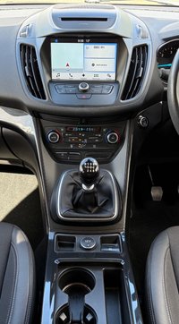 USED 2017 67 FORD KUGA 2.0 TDCi Titanium SUV 5dr Diesel Manual Euro 6 (s/s) (150 ps) This 2017 Ford Kuga Titanium finished in Metallic Grey has covered 63k miles and comes with a good service history, recently serviced on 31st January 2026.  Sat nav & Bluetooth - Cruise control - Rear parking sensors - Heated front screen - Climate control - Electric folding mirrors  A comfortable, practical SUV that&rsquo;s ULEZ & CAZ compliant and ready to drive away.
