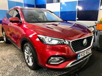 USED 2022 22 MG MG HS 1.5 T-GDI 16.6kWh Exclusive SUV 5dr Petrol Plug-in Hybrid Auto Euro 6 (s/s) (258 ps) A stunning example of this very highly prized petrol hybrid automatic  Suv finished in Dynamic Red complimented with 18" 5 twin spoke alloys .This car comes fully serviced with full 12 months mot and comes equipped with panoramic glass roof with sunroof ,rear parking sensors with reverse camera , full electric tailgate ,detachable towbar ,keyless entry and go ,adaptive cruise control ad speed limiter .on board computer ,touch screen satellite navigation ,Dab stereo with usb input ,dual zone digi