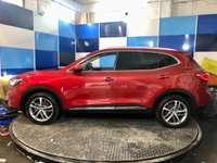 USED 2022 22 MG MG HS 1.5 T-GDI 16.6kWh Exclusive SUV 5dr Petrol Plug-in Hybrid Auto Euro 6 (s/s) (258 ps) A stunning example of this very highly prized petrol hybrid automatic  Suv finished in Dynamic Red complimented with 18" 5 twin spoke alloys .This car comes fully serviced with full 12 months mot and comes equipped with panoramic glass roof with sunroof ,rear parking sensors with reverse camera , full electric tailgate ,detachable towbar ,keyless entry and go ,adaptive cruise control ad speed limiter .on board computer ,touch screen satellite navigation ,Dab stereo with usb input ,dual zone digi