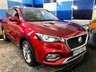 USED 2022 22 MG MG HS 1.5 T-GDI 16.6kWh Exclusive SUV 5dr Petrol Plug-in Hybrid Auto Euro 6 (s/s) (258 ps) A stunning example of this very highly prized petrol hybrid automatic  Suv finished in Dynamic Red complimented with 18" 5 twin spoke alloys .This car comes fully serviced with full 12 months mot and comes equipped with panoramic glass roof with sunroof ,rear parking sensors with reverse camera , full electric tailgate ,detachable towbar ,keyless entry and go ,adaptive cruise control ad speed limiter .on board computer ,touch screen satellite navigation ,Dab stereo with usb input ,dual zone digi