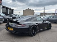 USED 2008 58 PORSCHE 911 3.6 997 Turbo Coupe 2dr Petrol Tiptronic S AWD (326 g/km, 480 bhp) PANORAMIC ROOF+ FULL LEATHER TRIM+ PRICAVY GLASS+ AWD PASM ADAPTIVE SUSPENTION+ ACTIVE REAR SPOILER+ XENON HEADLIGHTS+ HEATED ELECTRIC SEATS+ TURBO WHEELS+ PCM NAVIGATION+ CLIMATE CONTROL+ CRUISE CONTROL+ BOSE SOUND SYSTEM+ REAR PARKING SENSORS+ MULTIFUNCTION STEERING WHEEL+ MEMORY SEATS+ SPORT CHRONO PACKAGE TURBO+ SPORT MODE+ CD PLAYER+ 19 INCH ALLOY WHEELS+