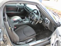 PRE-OWNED 2014 14 MAZDA MX-5 1.8i SE Convertible 2dr Petrol Manual Euro 5 (126 ps) Sparkling Black Metallic, Black Interior, 16" Alloy Wheels, Climate Control Air Conditioning, Upgraded JVC Music System With Apple CarPlay, Rear Spoiler, Remote Central Locking With Deadlocks, Electric Mirrors, Electric Windows, Remote Boot Release, Power Steering, Dynamic Stability Control, Stainless Steel Scuff Plates, Traction Control System, Tyre Pressure Monitoring System, Thatcham Category 1 alarm/Immobiliser, 2 Keys and Book Pack, Service History.